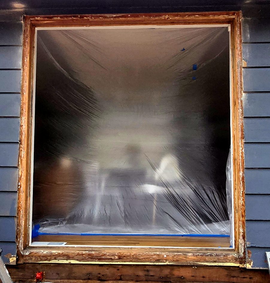 Rough opening exposed after the old patio door and frame were removed