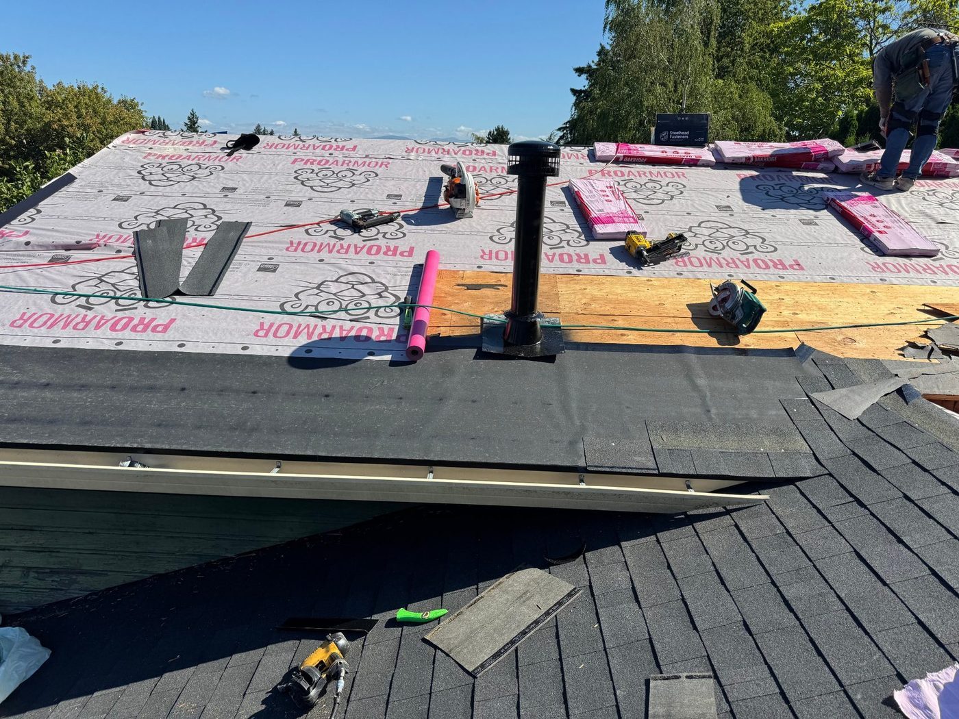 Synthetic underlayment installed over repaired roof deck