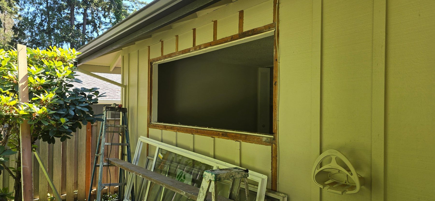 Window opening prepared in the exterior wall before installing a new window